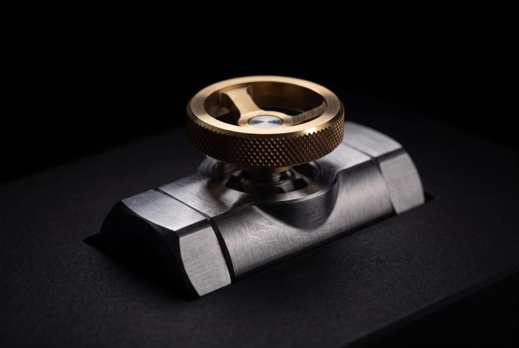 Brass control dial mounted on a precision measurement base