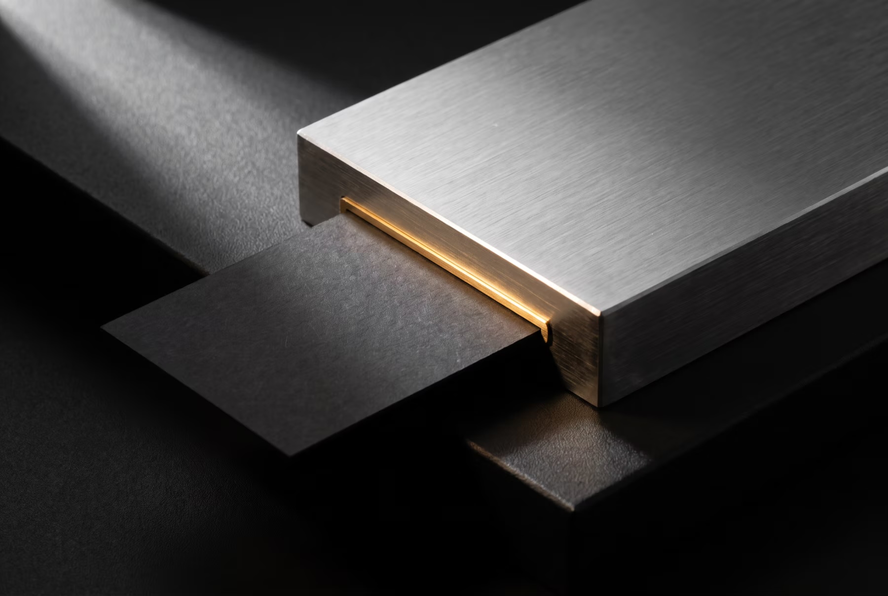 Layered black and silver modules forming a publishing stack