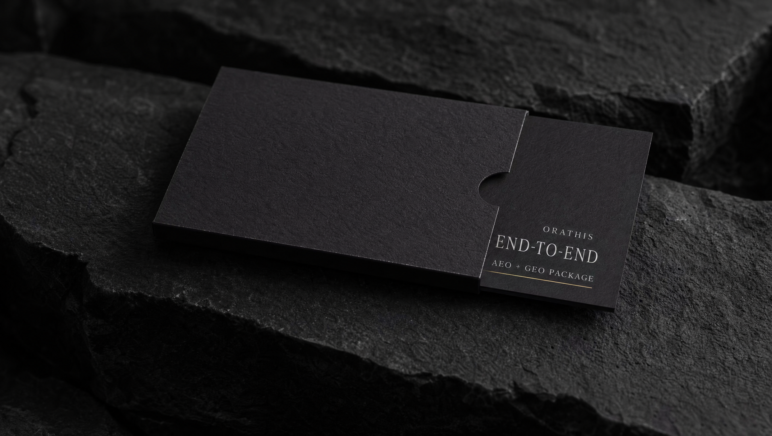 End-to-End AEO and GEO Package card presented against layered black stone