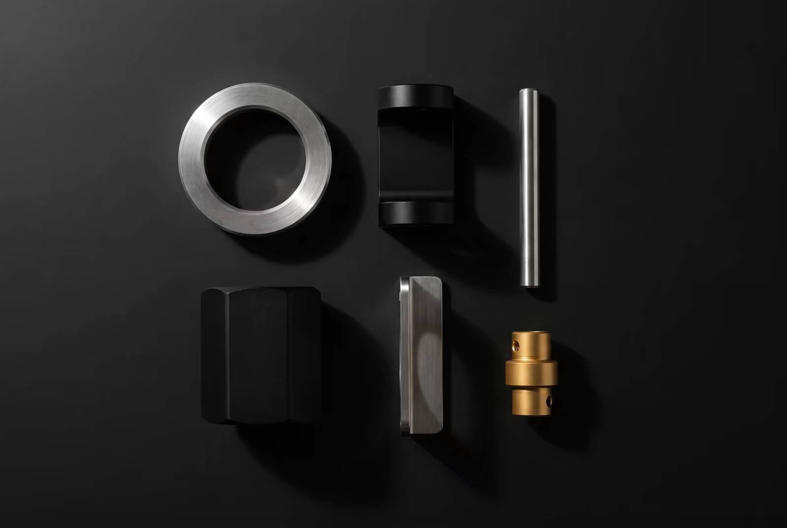 Precision black, silver, and gold components arranged for a structured site rebuild